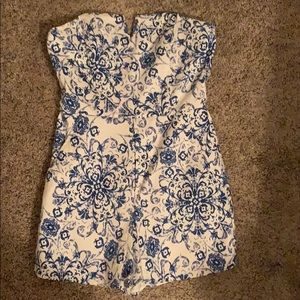 Blue and white sleeveless romper